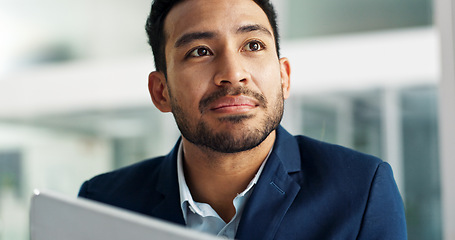 Image showing Business man, thinking and planning on computer for ideas, brainstorming and legal review in office or law firm. Young Asian lawyer or corporate employee with vision and online solution for report