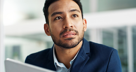 Image showing Business man, thinking and planning on computer for ideas, brainstorming and legal review in office or law firm. Young Asian lawyer or corporate employee with vision and online solution for report