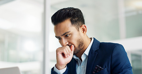 Image showing Business man, thinking and stress on computer for legal research, law firm problem solving or decision in office. Aisan person or lawyer with doubt, mistake or ideas on laptop for report or article