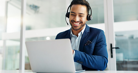 Image showing Laptop, smile and business man in call center office with headset for customer support or service. Computer, contact and communication with happy employee working in tech agency for consulting