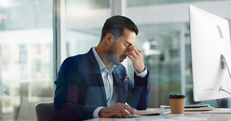 Image showing Business man, headache and tired on computer for information technology, online planning and office stress. Worker, programmer or developer with fatigue, pain or frustrated for mistake on desktop