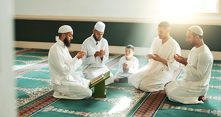 Image showing Islam, prayer and group of men in mosque with child, mindfulness and gratitude in faith. Worship, religion and Muslim people together in holy temple for praise, spiritual teaching and peace with boy.