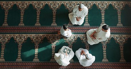 Image showing Islamic prayer, worship and men in mosque with child, mindfulness and gratitude in faith from above. Love, religion and Muslim people together in holy temple for praise, spiritual teaching and peace.