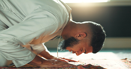 Image showing Islamic prayer man on mat in mosque with mindfulness, love and gratitude in faith commitment. Worship, religion and Muslim person in holy temple for praise, spiritual teaching and meditation peace.