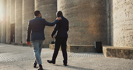 Image showing City, talking and walking with business men outdoor together on morning commute to corporate job. Collaboration, travel or conversation with mentor and employee on sidewalk or street of urban town