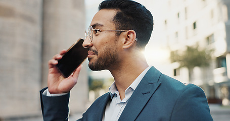 Image showing Asian businessman, phone call or happy by buildings in city, office view or talking by workplace in professional career. Young lawyer, chat or smartphone in connection or communication in cbd in town