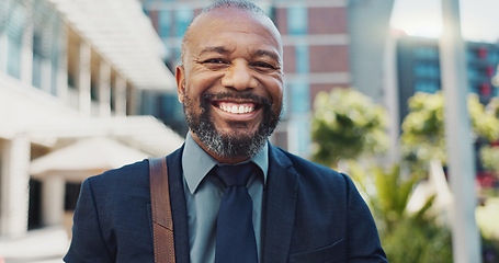 Image showing Smile, face and mature businessman in the city with positive, good and confident attitude. Happy, portrait and professional African male lawyer with legal career standing in urban town street.