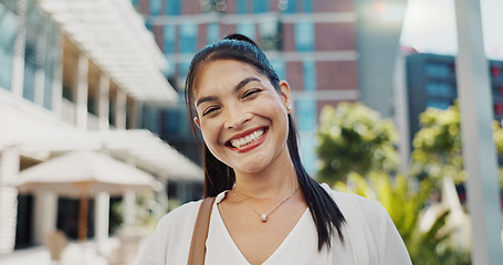 Image showing Businesswoman, city and face with happy by buildings in morning, pride and travel to workplace in accounting career. Young person, portrait and professional with confidence and working in town in cbd