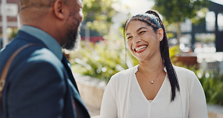 Image showing Business people, laughing and discussion outdoor in city with morning commute, partnership and travel. Employees, man and woman with conversation, collaboration and happy for networking in urban town