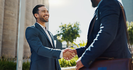 Image showing City, business people and handshake with happy employees and smile from project deal and success. Conversation, teamwork and outdoor with staff and urban building with speaking and shaking hands