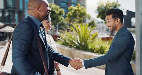 Image showing Business people, welcome and handshake in city meeting for partnership, intro or collaboration outdoor. Hello, shaking hands and team outside with thank you, support or onboarding negotiation success