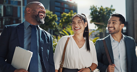 Image showing Business people, walking and travel in city with talking on morning commute, partnership and happy. Employees, men and woman with conversation, collaboration and networking outdoor in urban town