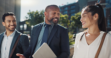 Image showing Business people, travel and group in city with discussion on morning commute, partnership and walking. Employees, man and woman with conversation, collaboration and networking outdoor in urban town