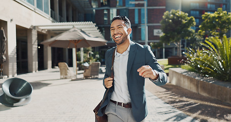 Image showing Business, outdoor and dancing with man, celebration and smile with happiness and promotion. Expression, Japanese person or entrepreneur with movement or energy with professional, achievement or bonus