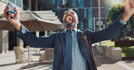 Image showing Business, celebration and senior man with phone in city street for news, success and winner fist victory. Smartphone, app and African male entrepreneur outdoor with competition prize, reward or bonus