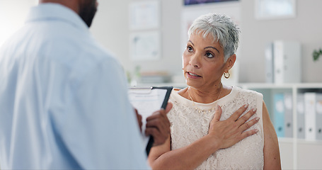 Image showing Patient, doctor and chest pain for consultation advice with clipboard for checklist or inflammation, Indigestion or infection. Female person, wellness and retirement or lung illness, healing or help