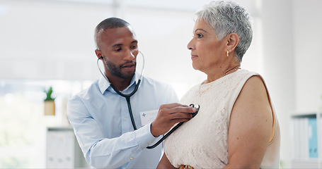 Image showing Stethoscope, examination and doctor with senior woman at hospital for lungs, chest or breathing assessment. Heart, listen and elderly patient consulting cardiologist for heartbeat, pulse or checkup