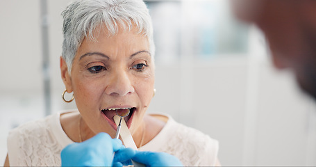 Image showing Patient, doctor and tongue depressor for throat assessment in clinic for respiratory infection, inflammation or wellness. Elderly woman, man and mirror for healthcare consultation, diagnosis or exam