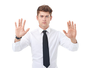 Image showing Portrait, business and man with stop, hands up and warning isolated on a white studio background. Face, serious person and model with review and employee with feedback and sign language with risk