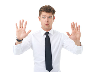 Image showing Portrait, business and man with warning, hands up and employee isolated on a white studio background. Face, person and consultant with hand gesture and stop with sign language and reject with review