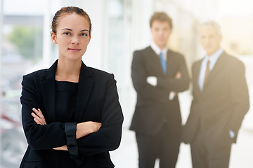 Image showing Businesswoman, office and confidence in meeting, portrait and pride for career in company. Serious female person, professional and support in team management, mentor and planning for collaboration