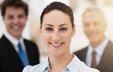 Image showing Business woman, happy in portrait and leadership at law firm, pride and ambition with attorney team. Corporate lawyer, smile for career in justice and supervisor in professional headshot at office