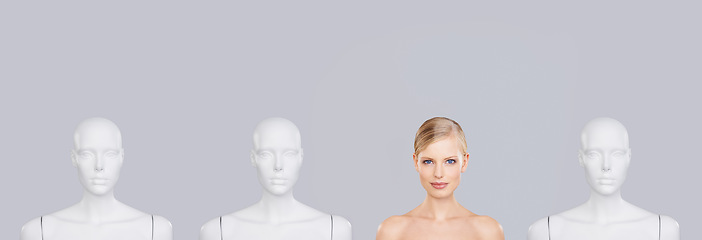 Image showing Woman, face and beauty with mannequin and unique for skincare, wellness and portrait on white background. Banner, natural cosmetics and dermatology with individuality, robot or dummy in studio