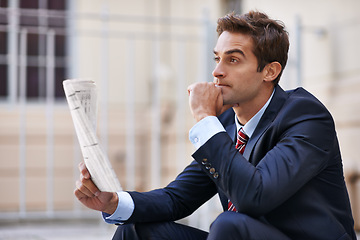 Image showing Thinking, business man and newspaper outdoor in city for opportunity, dream and reading. Paper, vision and consultant in urban town with decision, inspiration and serious employee planning future