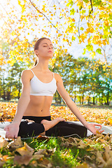 Image showing Woman, park and mediation on relaxation with peace for stress relief, break and focus for comfort and wellness. Spirituality, serenity and awareness for selfcare with calm, mindful and positivity.