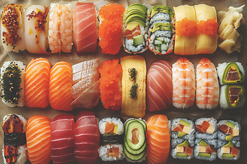 Image showing Assorted Delicious Sushi Set on Neutral Background