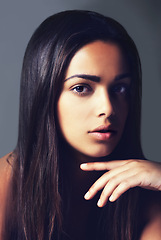 Image showing Portrait, hair care and beauty of woman, natural and shine in salon isolated on a grey studio background. Face, hairstyle and serious model in cosmetics, hairdresser and healthy skincare for glow