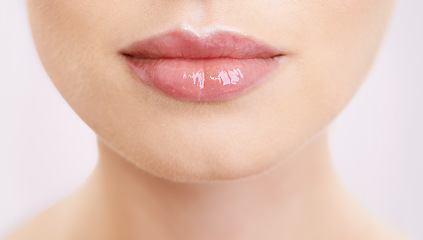 Image showing Beauty, lips and makeup with woman closeup in studio on purple background for mouth cosmetics. Skincare, lipstick and cosmetology with model at spa or salon for dermatology, makeover or treatment