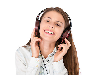 Image showing Portrait, smile and woman with headphones for music, podcast or album in studio isolated on white background. Face, radio and happy person listening to audio, sound and streaming song with technology