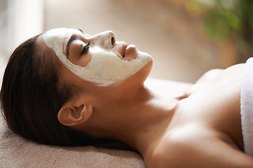 Image showing Skincare, wellness and woman with face mask at spa for glow, natural and beauty routine with peace. Cosmetic, pamper and female person relaxing for clay facial dermatology treatment at salon.