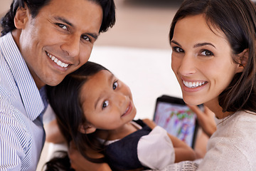 Image showing Happy family, portrait and tablet with games for entertainment, bonding or enjoying weekend at home. Mother, father and daughter on technology for holiday, online app or interaction together at house