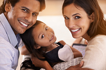 Image showing Happy, sofa and portrait of parents and child for bonding, relationship and relax in morning. Family, home and mother, father and young girl in living room for fun, childhood and weekend together