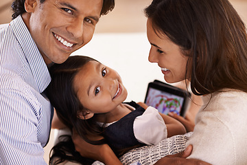Image showing Happy family, portrait and tablet with games for bonding, entertainment or enjoying weekend at home. Mother, father and daughter on technology for holiday, online app or interaction together at house
