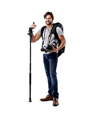 Image showing Photographer, backpack and smile with camera in studio for career, behind the scenes and equipment. Photography, person and happy with lighting, confidence and shooting gear for photoshoot or passion