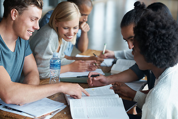 Image showing Education, college and students studying and reading together, share ideas and research for project. People in library, academic discussion for assignment on campus, diversity and scholarship