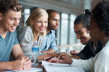 Image showing Education, people at university and students studying together, share ideas and research for project in library. Happy, academic discussion for assignment on campus and diversity with scholarship