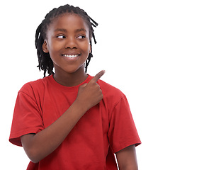 Image showing African child, studio and pointing for promotion, smile and gesture at mockup. Black kid, white background and point at open space, ad and confidence for idea of thought, marketing and sales