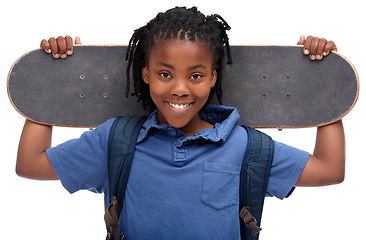 Image showing Portrait, smile and african boy skater in studio isolated on white background for sports or leisure. Kids, happy or training and face of confident young kid with board for skating or recreation