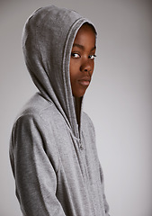 Image showing Hoodie, fashion and portrait of teenager in studio with serious kid in stylish streetwear on grey background. African, child and cool boy with casual style, clothes and comfortable outfit in mockup