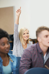 Image showing Happy woman, college or student with hand up for education, knowledge or answer in school. Girl, development or female person asking with smile, class question or creative solution for learning ideas