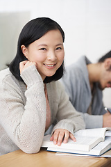 Image showing Portrait, university or Asian woman in classroom for knowledge, school development or books. Scholarship, education or face of happy girl student with smile for studying or learning in college campus