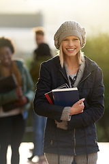 Image showing Student, happy woman and portrait with books on campus, education and learning material for studying. Scholarship, smile at university for academic growth, textbook or notebook with knowledge outdoor