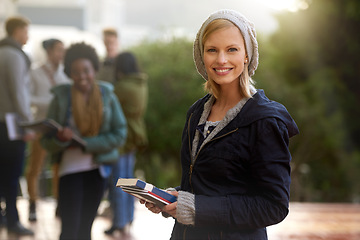 Image showing Woman, portrait and student outdoor with books for studying, learning and education for academic growth. Knowledge, scholarship and degree with smile on campus, college with textbook or folder