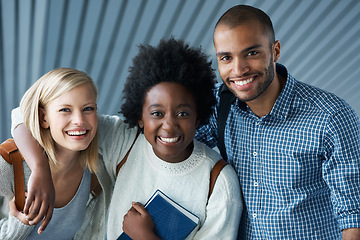 Image showing Friends, hug and happy portrait in university with diversity of students together to study in education. College, people and smile on campus with inclusion in school with collaboration or support