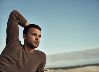 Image showing Man, dune and sand for thinking, contemplating and planning with vision and ideas. Tourist, cape town beach and ocean for travel, holiday or vacation in summer with nature and water and break