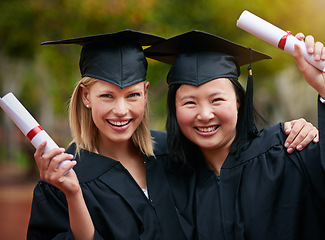 Image showing Portrait, graduation and smile with student friends outdoor on campus for university or college event. Face, certificate and success with young graduate women at school for education or scholarship